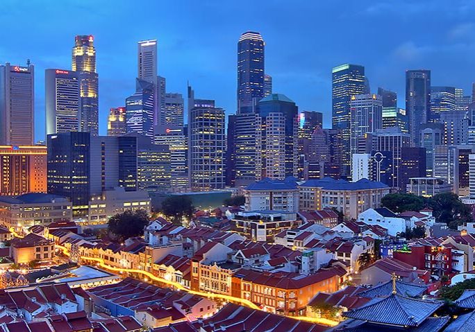 Singapore_skyline_from_Chinatown_at_blue_hour_8463911183